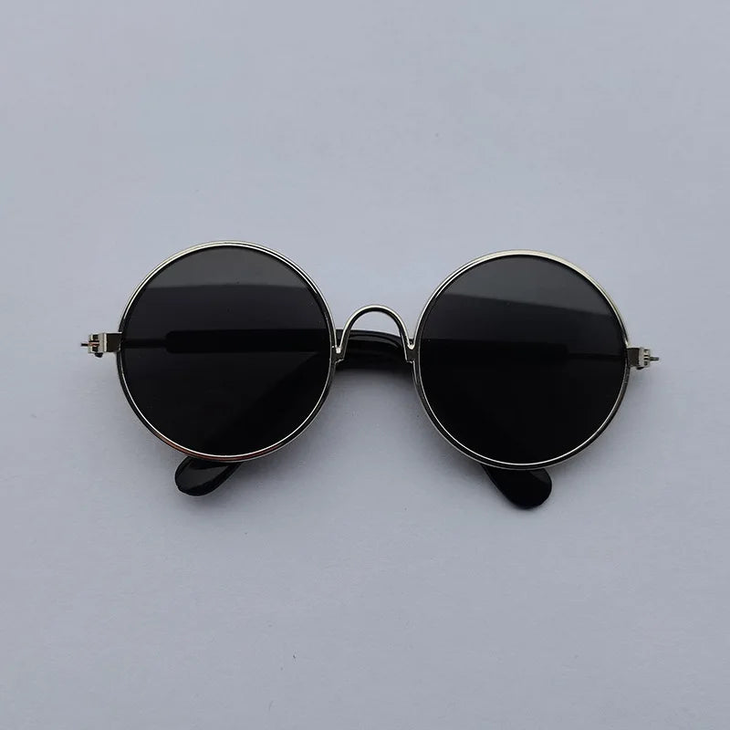 Black dog sunglasses with silver frame.