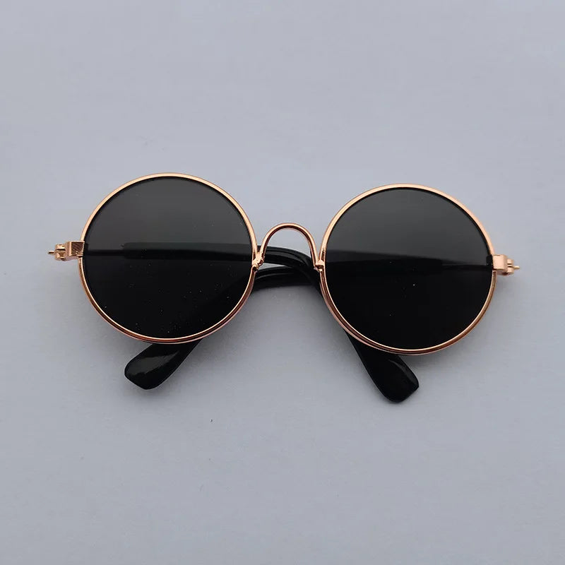 Black dog sunglasses with bronze frame.