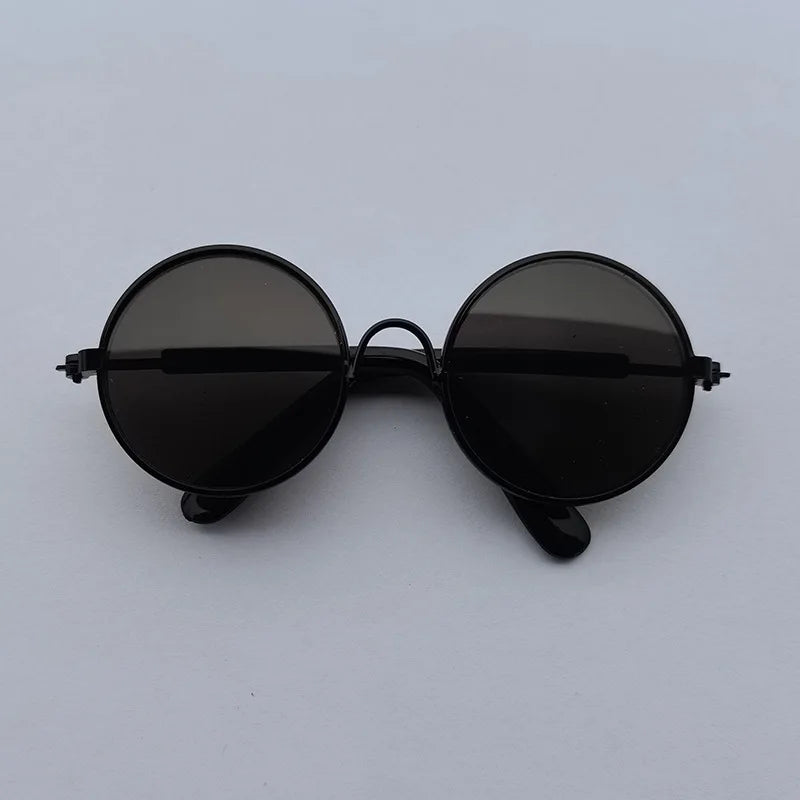 Black dog sunglasses with black frame.