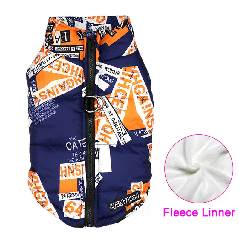 Blue and orange padded waterproof dog vest with leash hooks. Image shows graffiti-like graphics.