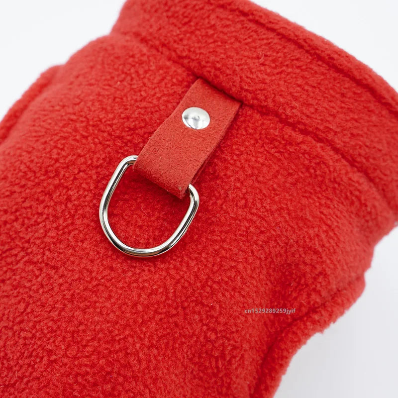 Close-Up image of the red warm dog fleece vest with leash hook.