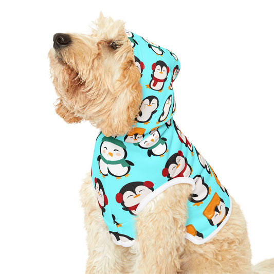 Goldendoodle wearing a winter penguin dog hoodie.