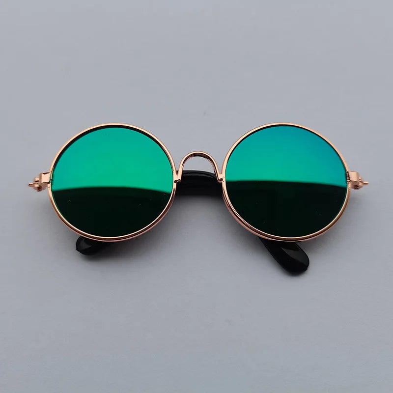 Green reflective dog sunglasses with bronze frame.