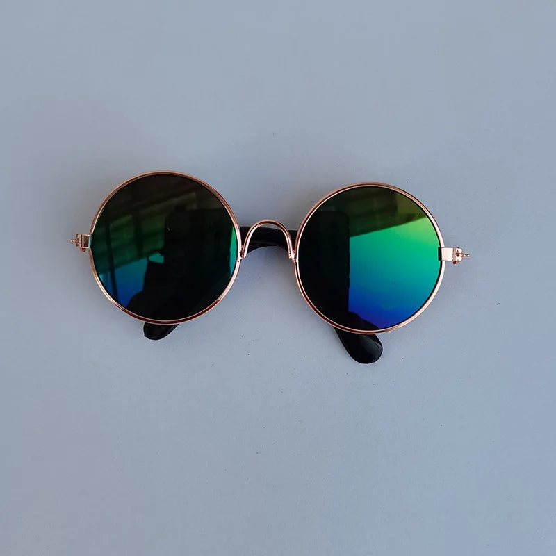 Green and Blue dog sunglasses with bronze frame.