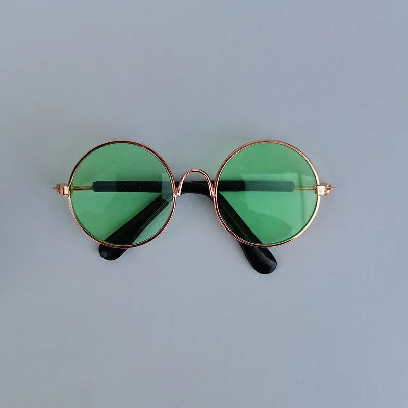 Light green dog sunglasses with bronze frame.