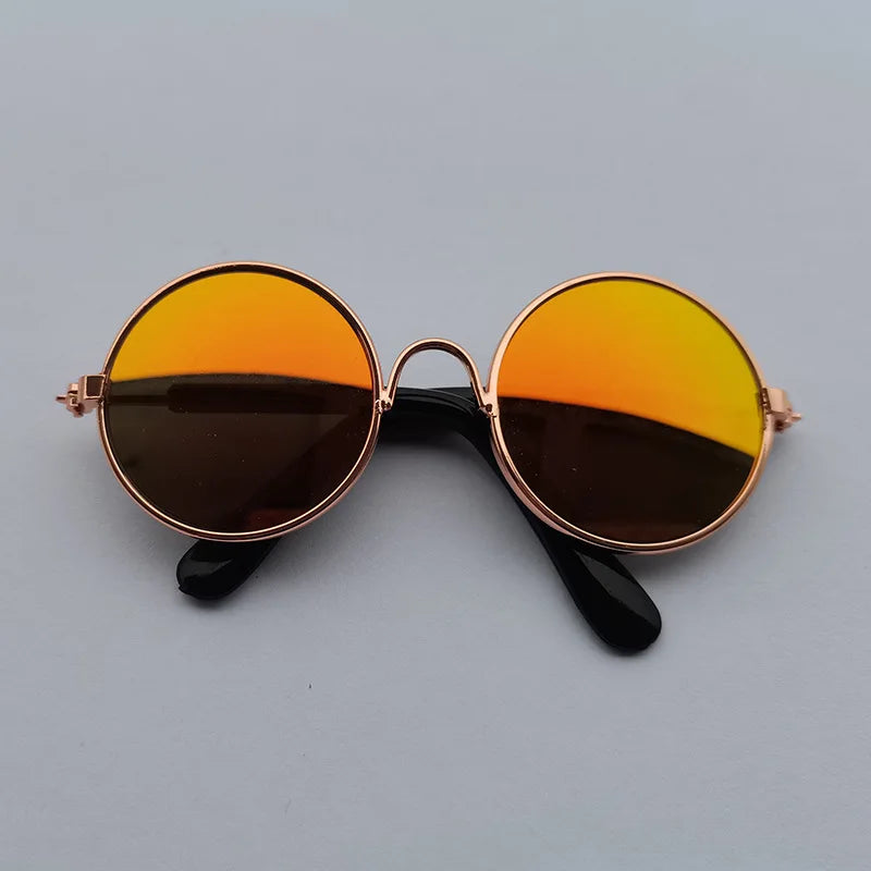 Orange reflective dog sunglasses with bronze frame.