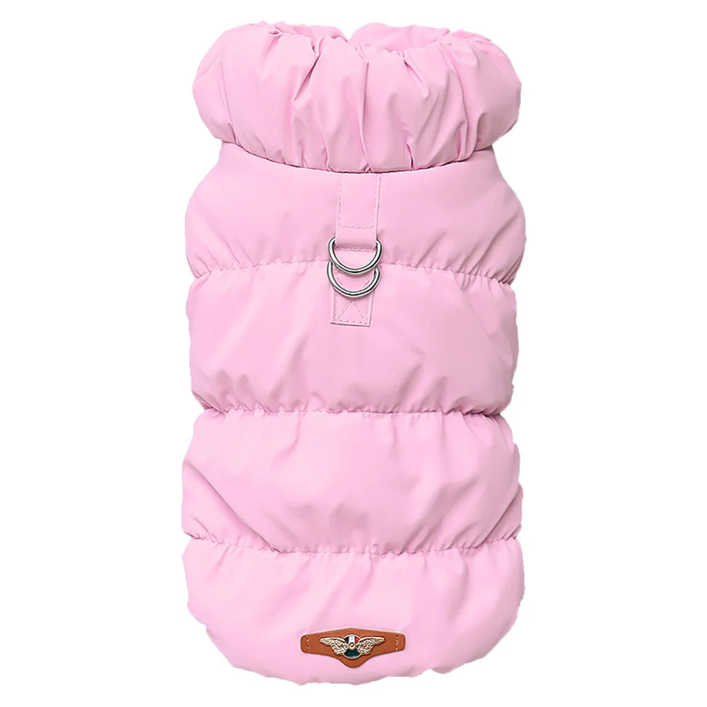 Pink puddy dog vest with leash hooks with aviation logo at the bottom.