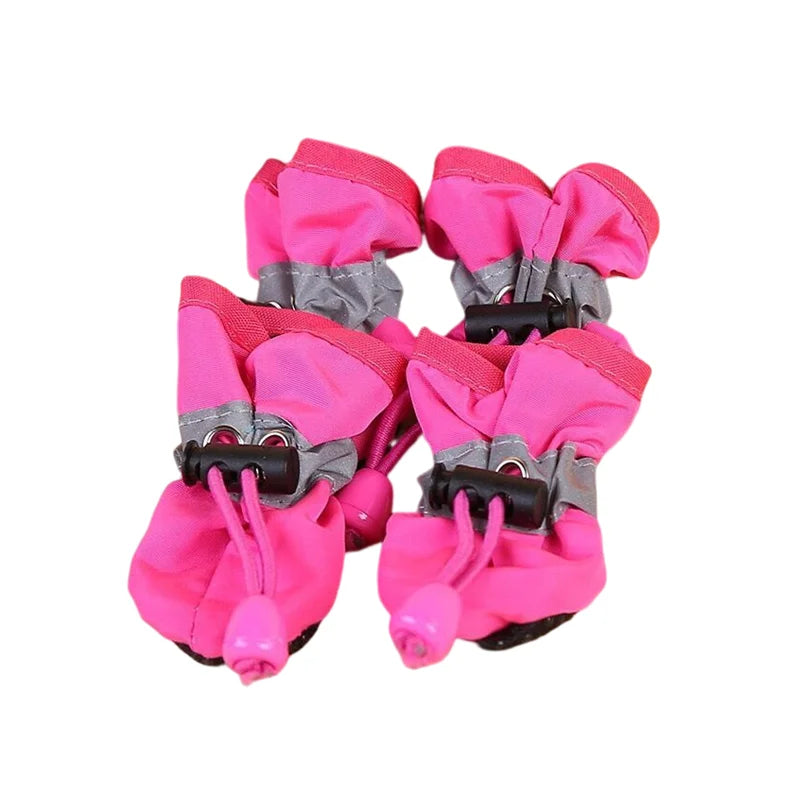 Pink waterproof dog shoes with tightening mechanism.