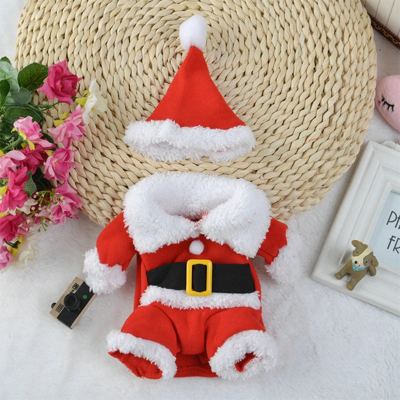 Santa Claus dog jumpsuit outfit with hat. Background includes dog decor and flowers.