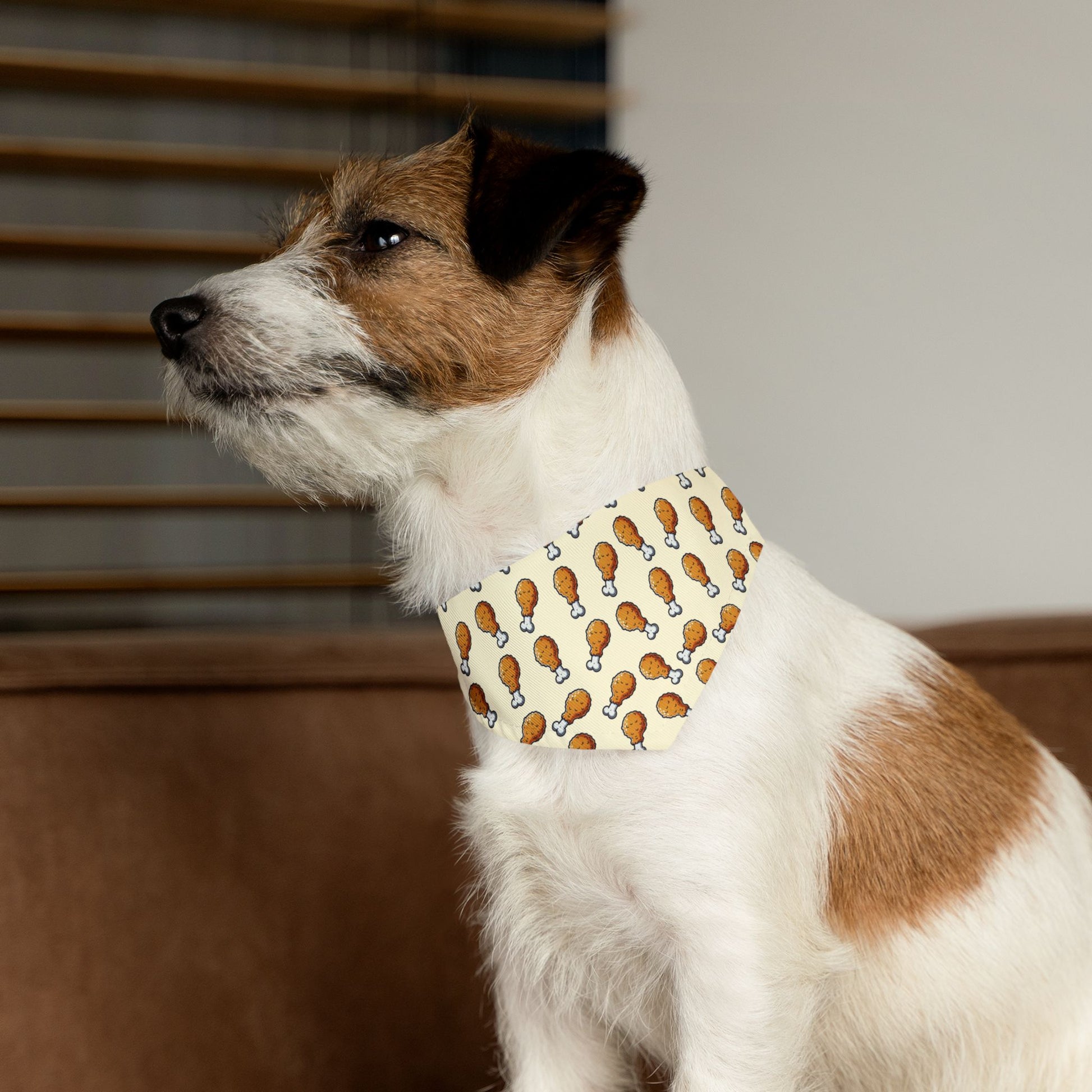 Terrier wearing fried chicken dog bandana collar.