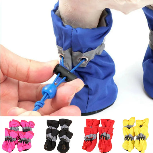 Blue waterproof dog shoes with tightening tie. Other colors such as pink, black, red, and yellow shown at the bottom.