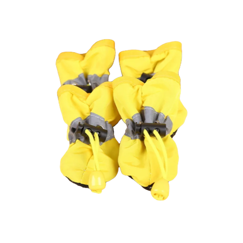 Yellow waterproof dog shoes with tightening mechanism.